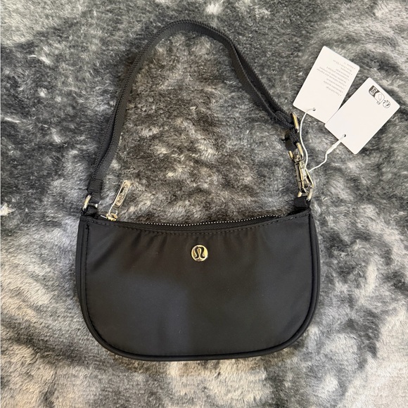 lululemon athletica Handbags - lululemon Classic Black Mini Shoulder Bag 1L